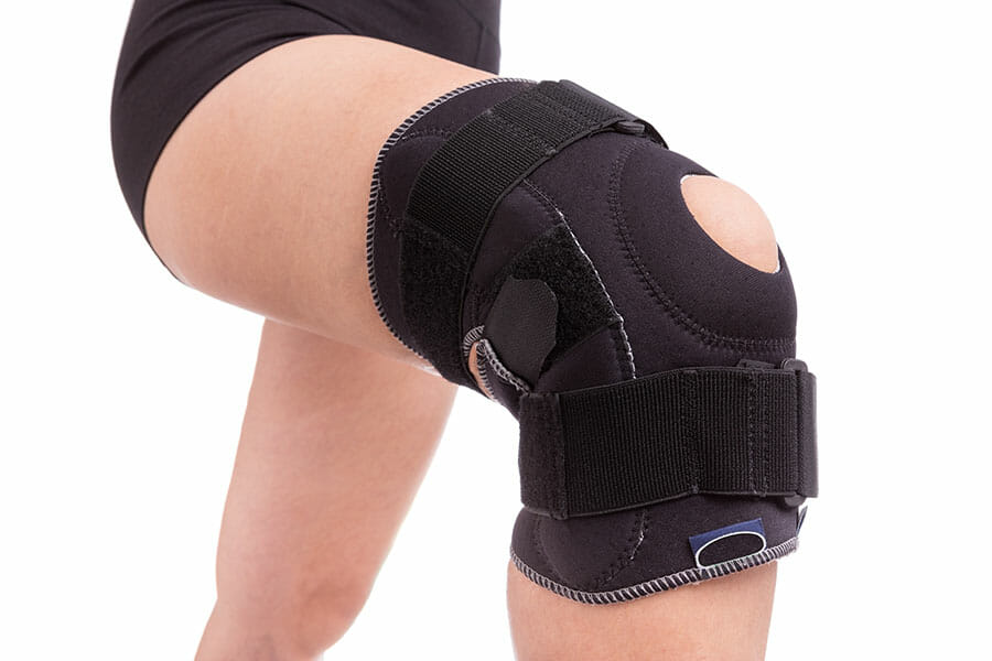 Woman in supportive leg brace physiotherapy oakville